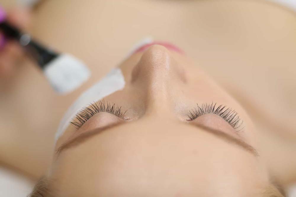 Woman getting Acne treatment