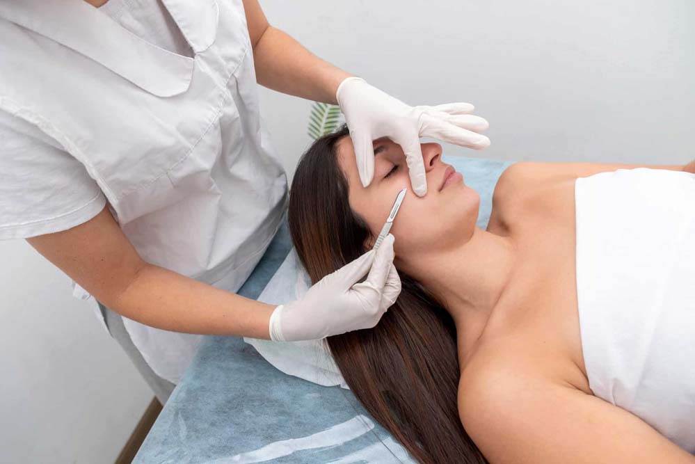 Woman getting Dermaplaning Treatment