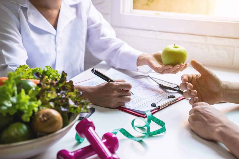 doctor with an apple in hand