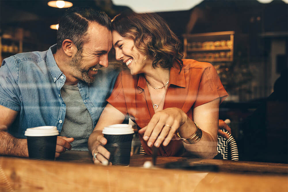 Beautiful couple in love having a coffee date